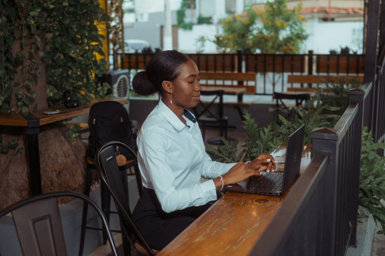 Kenyan business owner using Mkufunzi POS system